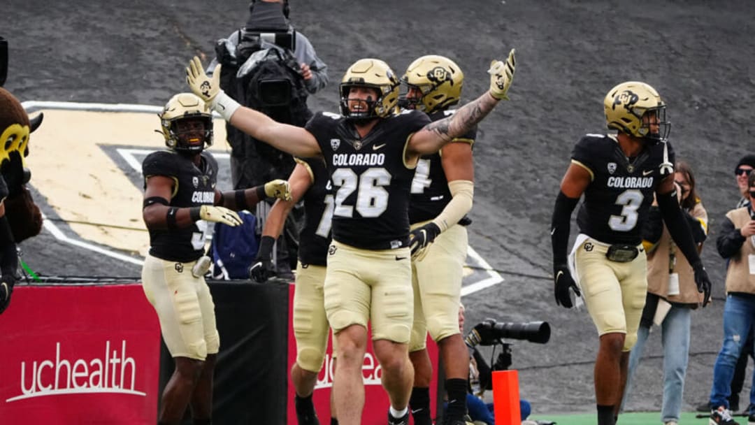 Nov 20, 2021; Boulder, Colorado, USA; Colorado Buffaloes linebacker Carson Wells (26) celebrates a score in the first quarter against the Washington Huskies at Folsom Field. Mandatory Credit: Ron Chenoy-USA TODAY Sports
