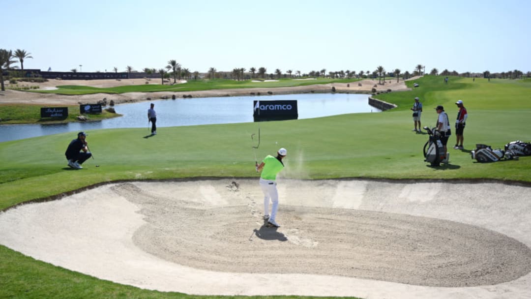 UNSPECIFIED, SAUDI ARABIA - JANUARY 30: Haotong Li of China plays his third shot on the 9th hole during Day 1 of the Saudi International at Royal Greens Golf and Country Club on January 30, 2020 in King Abdullah Economic City, Saudi Arabia. (Photo by Ross Kinnaird/Getty Images)