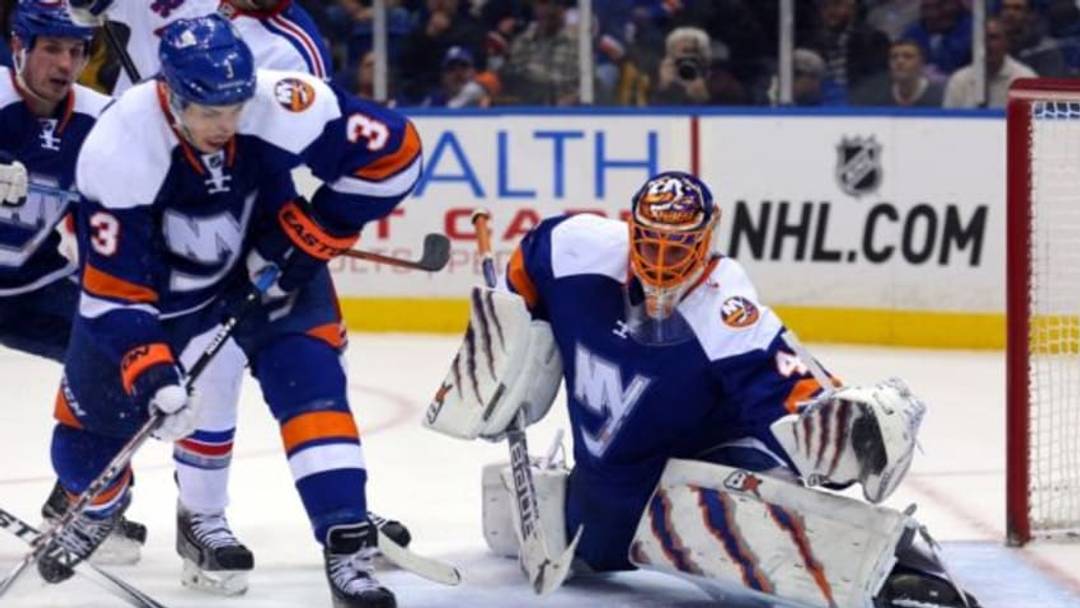 Jan 27, 2015; Uniondale, NY, USA; New York Islanders goalie Jaroslav Halak (41) makes a save against the New York Rangers during the third period at Nassau Veterans Memorial Coliseum. The Islanders defeated the Rangers 4-1. Mandatory Credit: Brad Penner-USA TODAY Sports