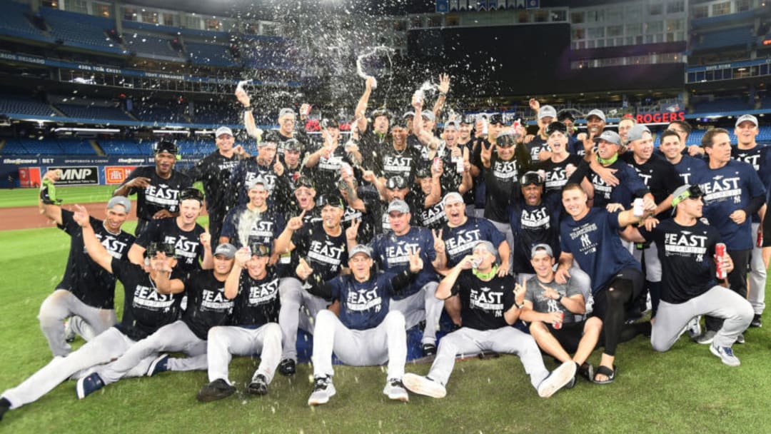 Sep 27, 2022; Toronto, Ontario, CAN; The New York Yankees pose for a team photo after defeating the Toronto Blue Jays to clinch the American League East division title at Rogers Centre. Mandatory Credit: Dan Hamilton-USA TODAY Sports