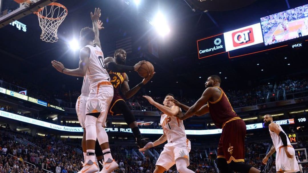 Jan 8, 2017; Phoenix, AZ, USA; Cleveland Cavaliers forward LeBron James (23) attempts a pass against the Phoenix Suns during the second half at Talking Stick Resort Arena. The Cavaliers won 120-116. Mandatory Credit: Joe Camporeale-USA TODAY Sports