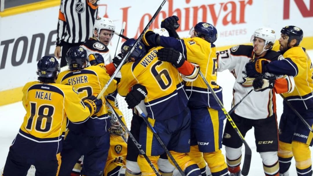 Oct 22, 2015; Nashville, TN, USA; Nashville Predators and Anaheim Ducks players fight in front of the goal during the third period at Bridgestone Arena. The Predators won 5-1. Mandatory Credit: Christopher Hanewinckel-USA TODAY Sports