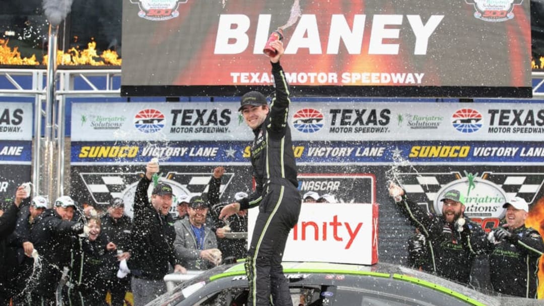 FORT WORTH, TX - APRIL 07: Ryan Blaney, driver of the #22 Fitzgerald Glider Kits Ford, celebrates in Victory Lane after winning the NASCAR Xfinity Series My Bariatric Solutions 300 at Texas Motor Speedway on April 7, 2018 in Fort Worth, Texas. (Photo by Chris Graythen/Getty Images)