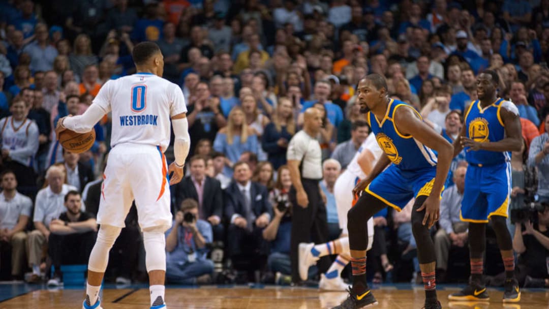 OKLAHOMA CITY, OK - FEBRUARY 11: Golden State Warriors Forward Kevin Durant (35) guarding Oklahoma City Thunder Guard Russell Westbrook (0) on February 11, 2017, at the Chesapeake Energy Arena Oklahoma City, OK. (Photo by Torrey Purvey/Icon Sportswire via Getty Images)