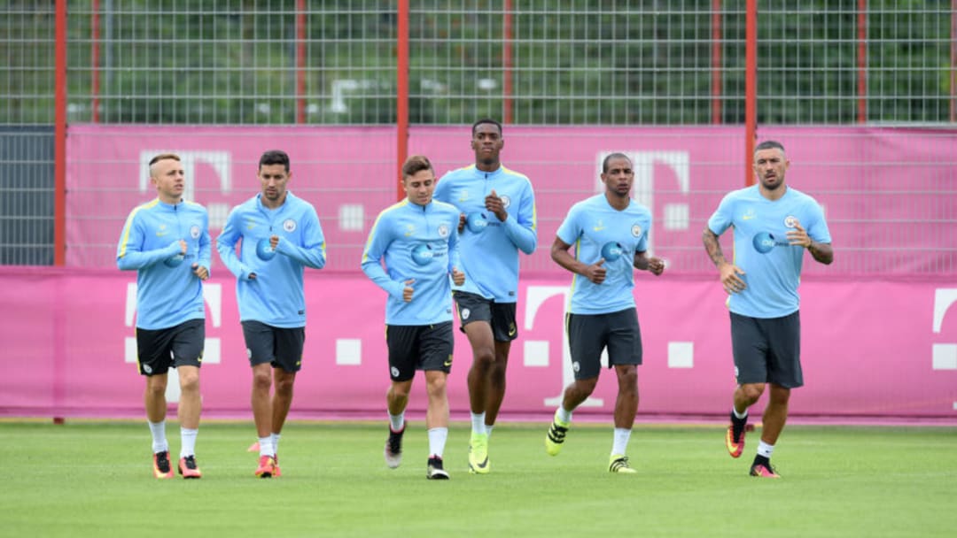 Players of Manchester City run during a team training session of Manchester City at the training ground of the German first division football team FC Bayern Munich in Munich, on July 21, 2016. / AFP / CHRISTOF STACHE (Photo credit should read CHRISTOF STACHE/AFP/Getty Images)