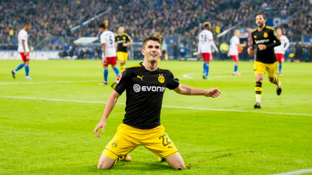 HAMBURG, GERMANY - SEPTEMBER 20: Christian Pulisic of Borussia Dortmund celebrates scoring the goal to the 0:3 during the Bundesliga match between Hamburger SV and Borussia Dortmund at the Volksparkstadion on September 20, 2017 in Hamburg, Germany. (Photo by Alexandre Simoes/Borussia Dortmund/Getty Images)
