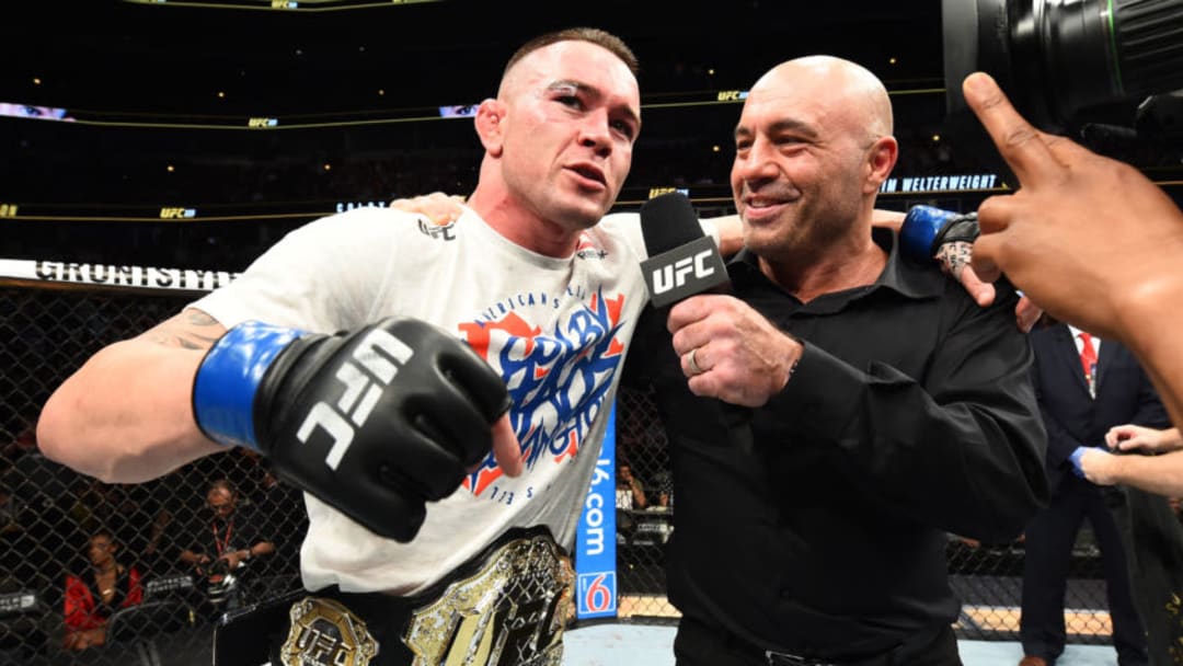 CHICAGO, ILLINOIS - JUNE 09: Colby Covington is interviewed by Joe Rogan after defeating Rafael Dos Anjos of Brazil in their interim welterweight title fight during the UFC 225 event at the United Center on June 9, 2018 in Chicago, Illinois. (Photo by Josh Hedges/Zuffa LLC/Zuffa LLC via Getty Images)