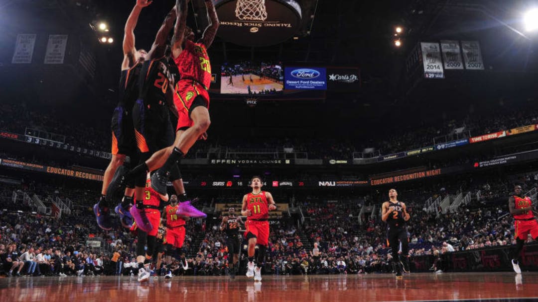 PHOENIX, AZ - FEBRUARY 2: John Collins #20 of the Atlanta Hawks shoots the ball against the Phoenix Suns on February 2, 2019 at Talking Stick Resort Arena in Phoenix, Arizona. NOTE TO USER: User expressly acknowledges and agrees that, by downloading and or using this photograph, user is consenting to the terms and conditions of the Getty Images License Agreement. Mandatory Copyright Notice: Copyright 2019 NBAE (Photo by Barry Gossage/NBAE via Getty Images)