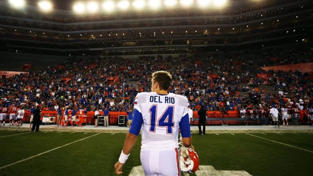 Apr 8, 2016; Gainesville, FL, USA; Florida Gators quarterback Luke Del Rio (14) walks off the field after the Orange and Blue game at Ben Hill Griffin Stadium. Blue won 38-6. Mandatory Credit: Logan Bowles-USA TODAY Sports