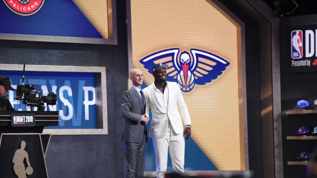 BROOKLYN, NY - JUNE 20: Zion Williamson shakes hands with NBA commissioner Adam Silver after being selected number one overall by the New Orleans Pelicans in the 2019 NBA Draft on June 20, 2019 at the Barclays Center in Brooklyn, New York. NOTE TO USER: User expressly acknowledges and agrees that, by downloading and/or using this photograph, user is consenting to the terms and conditions of the Getty Images License Agreement. Mandatory Copyright Notice: Copyright 2019 NBAE (Photo by Matteo Marchi/NBAE via Getty Images)