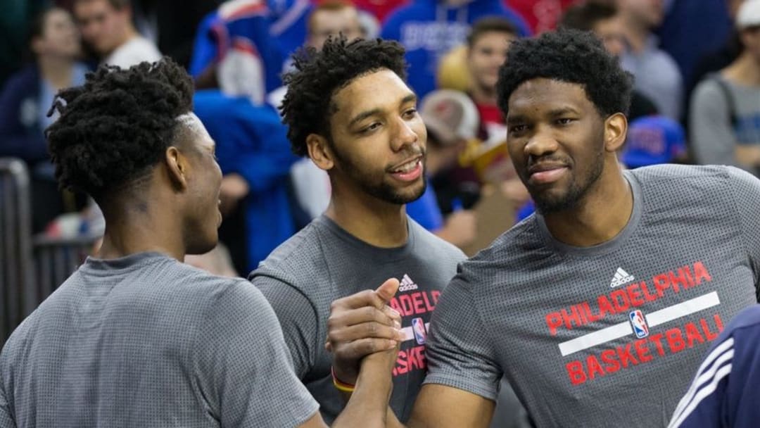 Dec 11, 2015; Philadelphia, PA, USA; Philadelphia 76ers center Joel Embiid (R) and center Jahlil Okafor (M) greet Detroit Pistons forward Stanley Johnson (L) prior to game action at Wells Fargo Center. Mandatory Credit: Bill Streicher-USA TODAY Sports