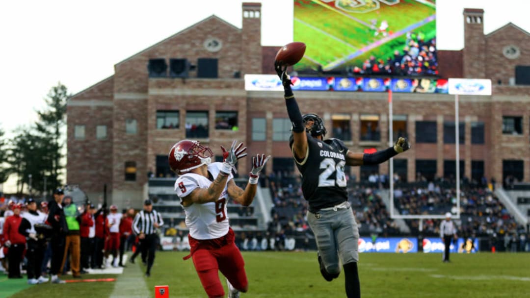 BOULDER, CO - NOVEMBER 19: Defensive back Isaiah Oliver #26 of the Colorado Buffaloes defends a pass away from wide receiver Gabe Marks #9 of the Washington State Cougars during the third quarter at Folsom Field on November 19, 2016 in Boulder, Colorado. Colorado defeated Washington State 38-24. (Photo by Justin Edmonds/Getty Images)