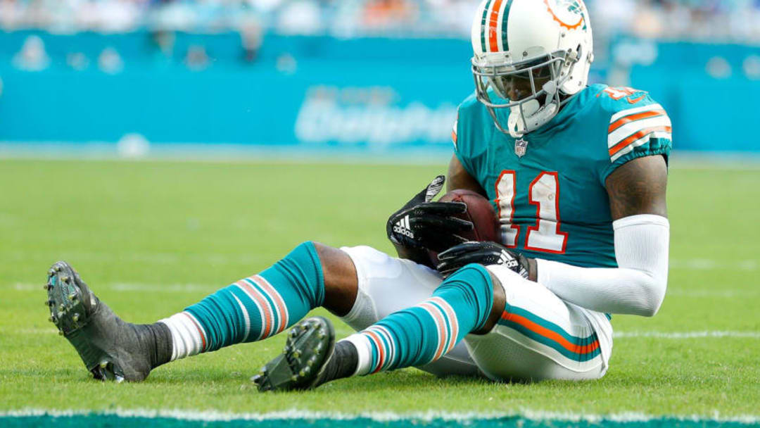 MIAMI, FL - DECEMBER 02: DeVante Parker #11 of the Miami Dolphins reacts after falling short of the endzone for a touchdown against the Buffalo Bills during the first half at Hard Rock Stadium on December 2, 2018 in Miami, Florida. (Photo by Michael Reaves/Getty Images)