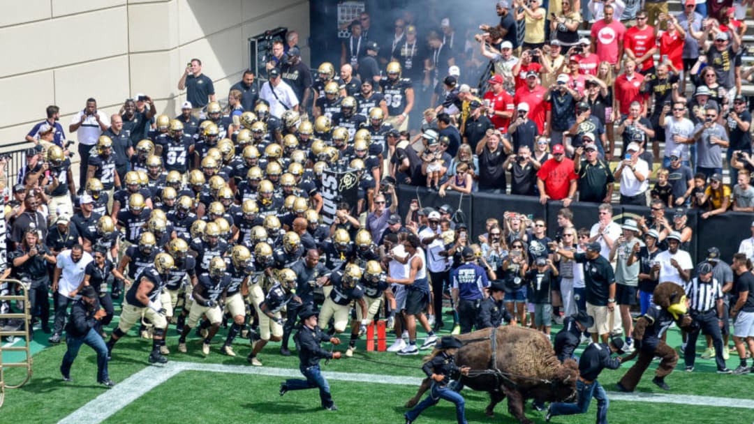 BOULDER, CO - SEPTEMBER 7: Colorado Buffaloes players follow Colorado Buffaloes mascot Ralphie onto the field before a am eagainst the Nebraska Cornhuskers at Folsom Field on September 7, 2019 in Boulder, Colorado. (Photo by Dustin Bradford/Getty Images)