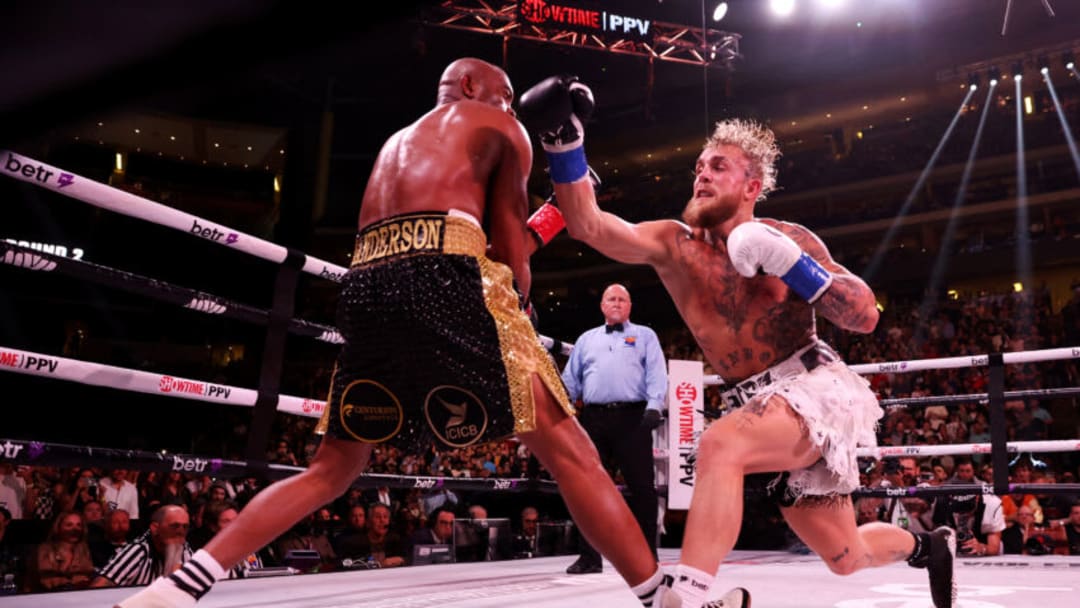 GLENDALE, ARIZONA - OCTOBER 29: Jake Paul (R) punches Anderson Silva of Brazil during their cruiserweight bout at Gila River Arena on October 29, 2022 in Glendale, Arizona. (Photo by Christian Petersen/Getty Images)