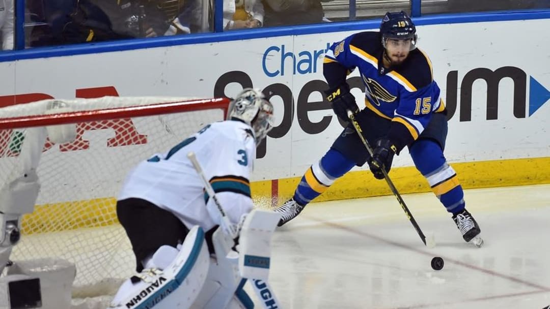 May 15, 2016; St. Louis, MO, USA; St. Louis Blues center Robby Fabbri (15) controls the puck around San Jose Sharks goalie Martin Jones (31) during the third period in game one of the Western Conference Final of the 2016 Stanley Cup Playoffs at Scottrade Center. The St. Louis Blues defeat the San Jose Sharks 2-1. Mandatory Credit: Jasen Vinlove-USA TODAY Sports
