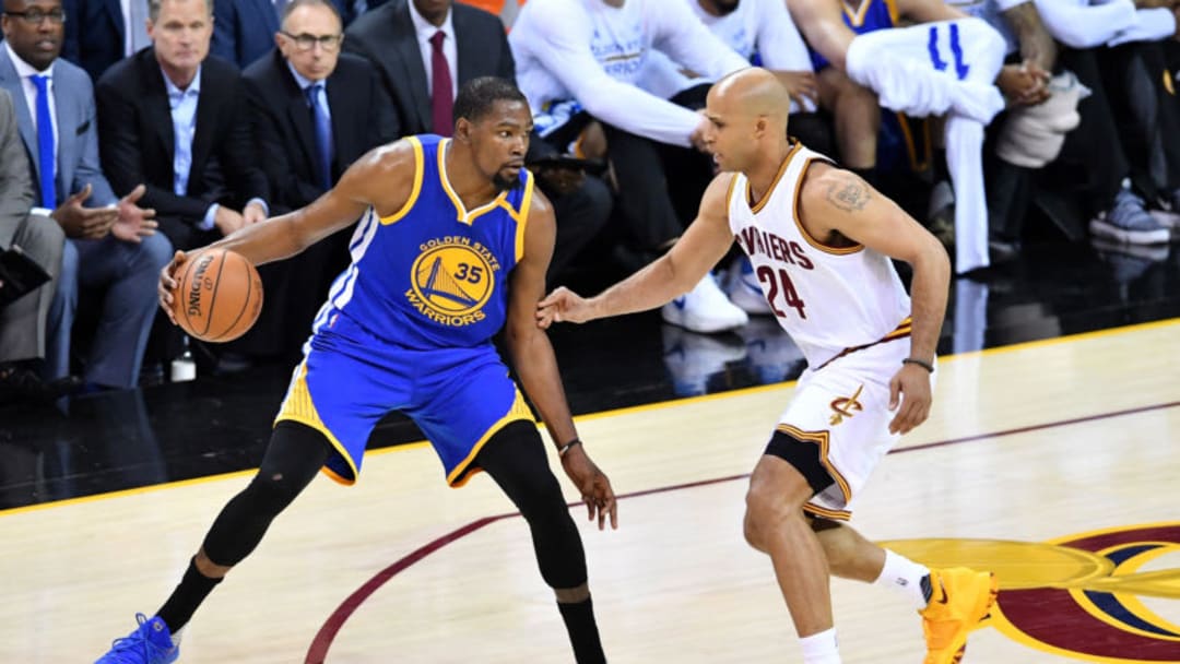 CLEVELAND, OH - JUNE 07: Kevin Durant #35 of the Golden State Warriors handles the ball against Richard Jefferson #24 of the Cleveland Cavaliers in the first half in Game 3 of the 2017 NBA Finals at Quicken Loans Arena on June 7, 2017 in Cleveland, Ohio. NOTE TO USER: User expressly acknowledges and agrees that, by downloading and or using this photograph, User is consenting to the terms and conditions of the Getty Images License Agreement. (Photo by Jason Miller/Getty Images)