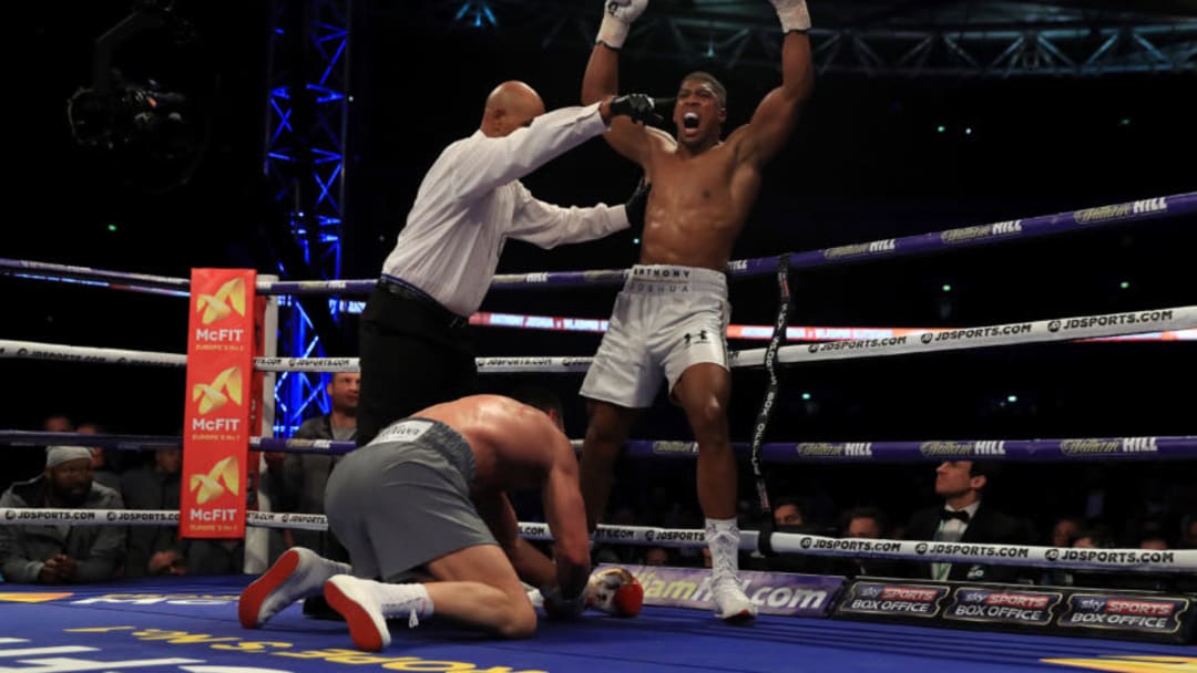 LONDON, ENGLAND - APRIL 29: Anthony Joshua (White Shorts) puts Wladimir Klitschko (Gray Shorts) down in the 5th round during the IBF, WBA and IBO Heavyweight World Title bout at Wembley Stadium on April 29, 2017 in London, England. (Photo by Richard Heathcote/Getty Images)