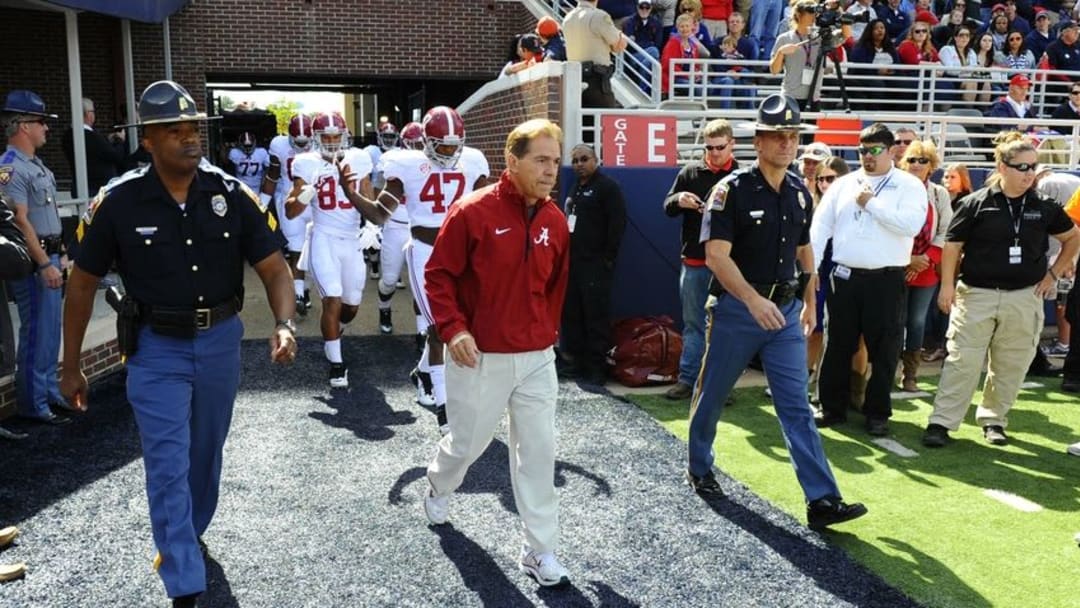 Oct 4, 2014; Oxford, MS, USA; Alabama Crimson head coach Nick Saban walks on to the field prior to the game against Mississippi Rebels at Vaught-Hemingway Stadium. Mandatory Credit: Christopher Hanewinckel-USA TODAY Sports