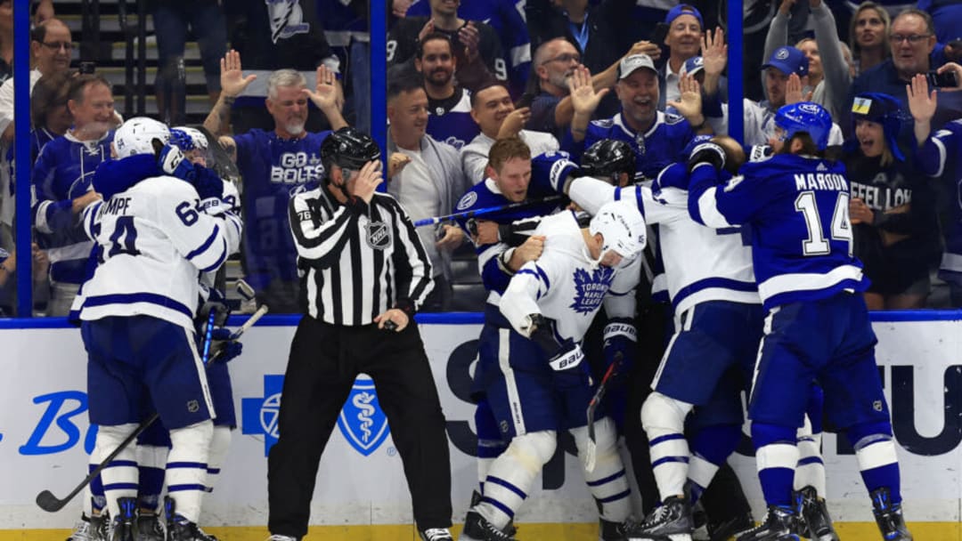 TAMPA, FLORIDA - APRIL 21: The Tampa Bay Lightning and the Toronto Maple Leafs fight in the third period during a game at Amalie Arena on April 21, 2022 in Tampa, Florida. (Photo by Mike Ehrmann/Getty Images)