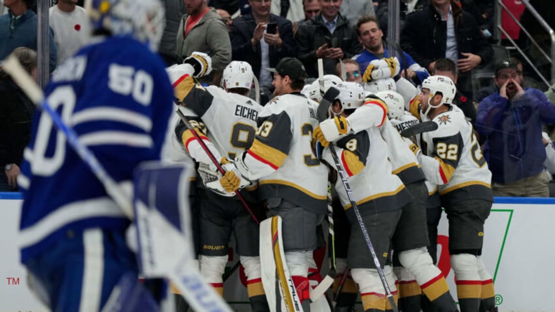 Nov 8, 2022; Toronto, Ontario, CAN; Vegas Golden Knights players celebrate a win against the Toronto Maple Leafs in overtime at Scotiabank Arena. Mandatory Credit: Nick Turchiaro-USA TODAY Sports