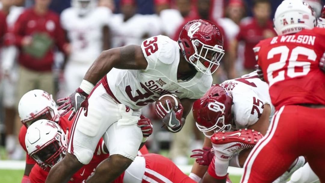 Sep 3, 2016; Houston, TX, USA; Oklahoma Sooners running back Samaje Perine (32) rushes during the first quarter against the Houston Cougars at NRG Stadium. Mandatory Credit: Troy Taormina-USA TODAY Sports