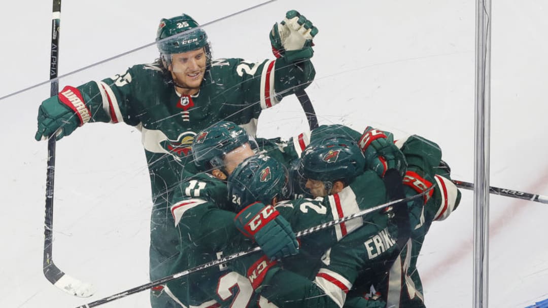 Aug 7, 2020; Edmonton, Alberta, CAN; Minnesota Wild, Joel Eriksson Ek #14, Matt Dumba #24, Jonas Brodin #25, Zach Parise #11. Mandatory Credit: Perry Nelson-USA TODAY Sports