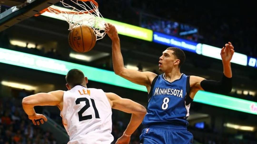 Nov 25, 2016; Phoenix, AZ, USA; Minnesota Timberwolves guard Zach LaVine (right) goes up for a dunk over Phoenix Suns center Alex Len in the first quarter at Talking Stick Resort Arena. Mandatory Credit: Mark J. Rebilas-USA TODAY Sports
