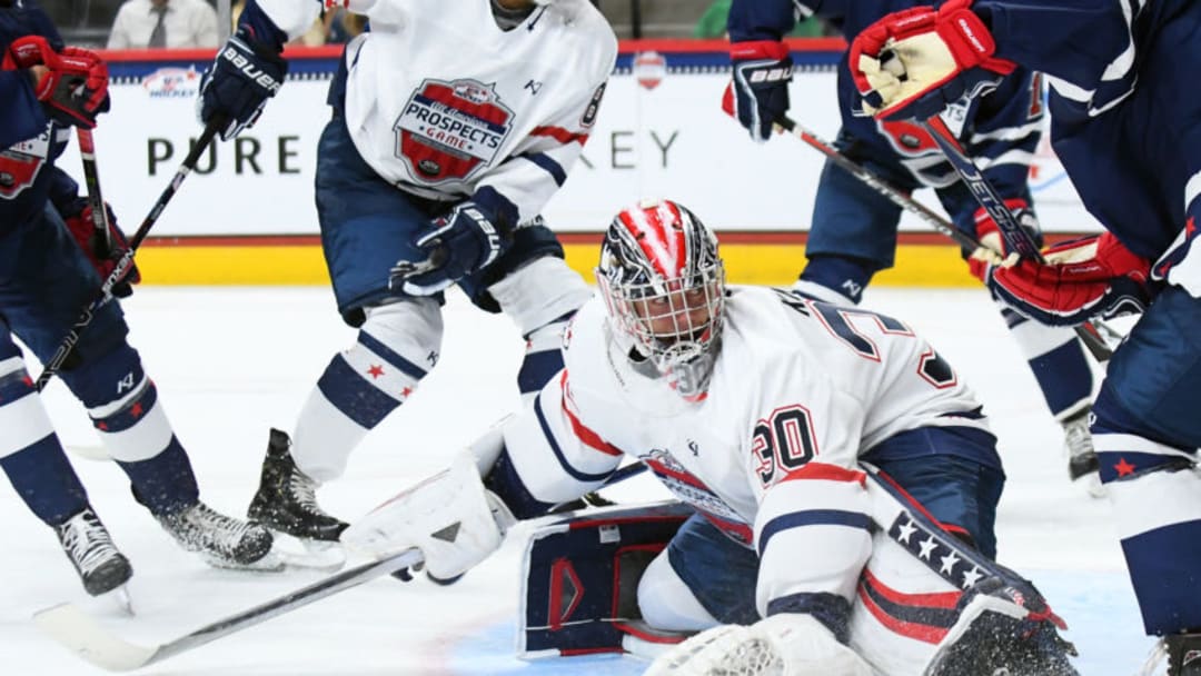 ST. PAUL, MN - SEPTEMBER 19: Team Langenbrunner goalie Spencer Knight (30) kicks the puck into the corner during the USA Hockey All-American Prospects Game between Team Leopold and Team Langenbrunner on September 19, 2018 at Xcel Energy Center in St. Paul, MN. Team Leopold defeated Team Langenbrunner 6-4.(Photo by Nick Wosika/Icon Sportswire via Getty Images)