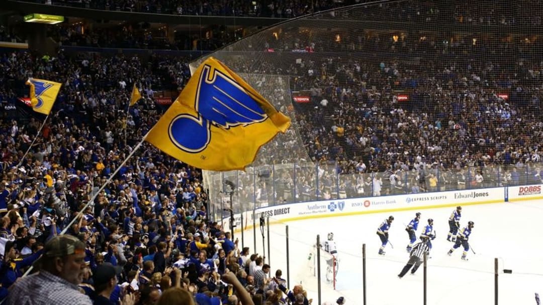 May 23, 2016; St. Louis, MO, USA; St. Louis Blues fans cheer in support after a goal scored by St. Louis Blues right wing Troy Brouwer (36) against the San Jose Sharks in the first period in game five of the Western Conference Final of the 2016 Stanley Cup Playoffs at Scottrade Center. The Sharks won 6-3. Mandatory Credit: Aaron Doster-USA TODAY Sports