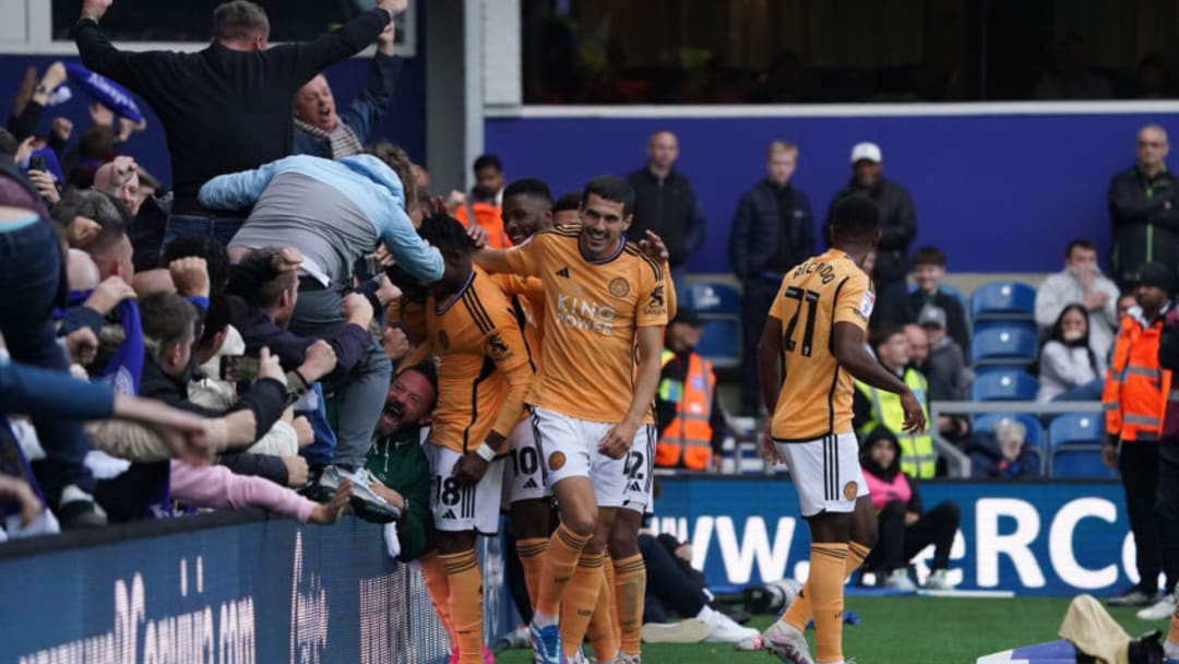 LONDON, ENGLAND - OCTOBER 28: The Leicester players celebrating Harry Winks goal to make it 1-2 with fan during the Sky Bet Championship match between Queens Park Rangers and Leicester City at Loftus Road on October 28, 2023 in London, England. (Photo by Dylan Hepworth/MB Media/Getty Images)