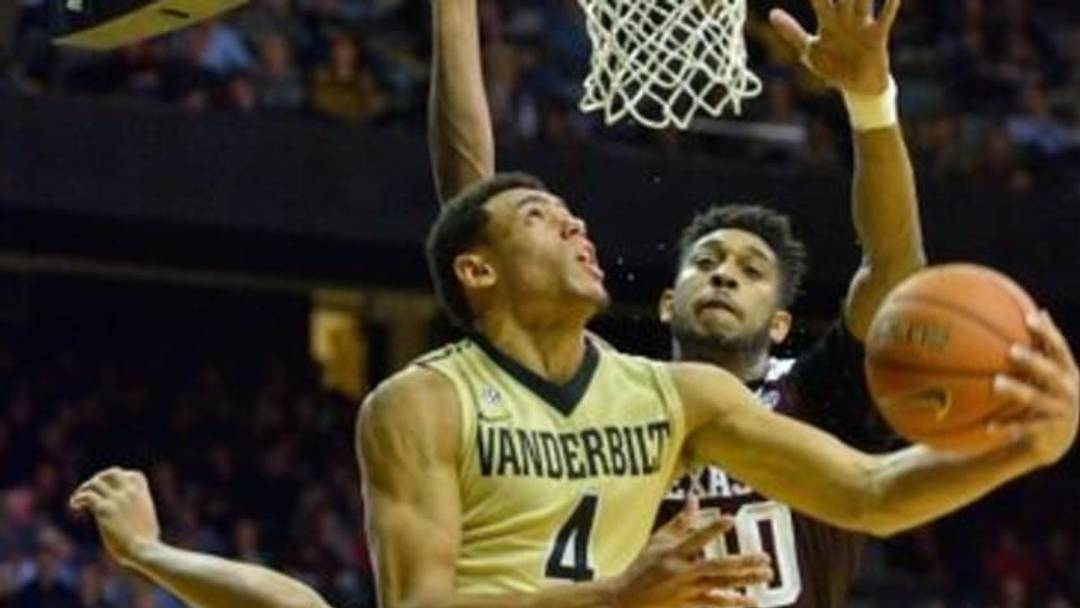 Feb 4, 2016; Nashville, TN, USA; Vanderbilt Commodores guard Wade Baldwin IV (4) drives to the basket against Texas A&M Aggies center Tonny Trocha-Morelos (10) during the second half at Memorial Gym. Vanderbilt won 77-60. Mandatory Credit: Jim Brown-USA TODAY Sports