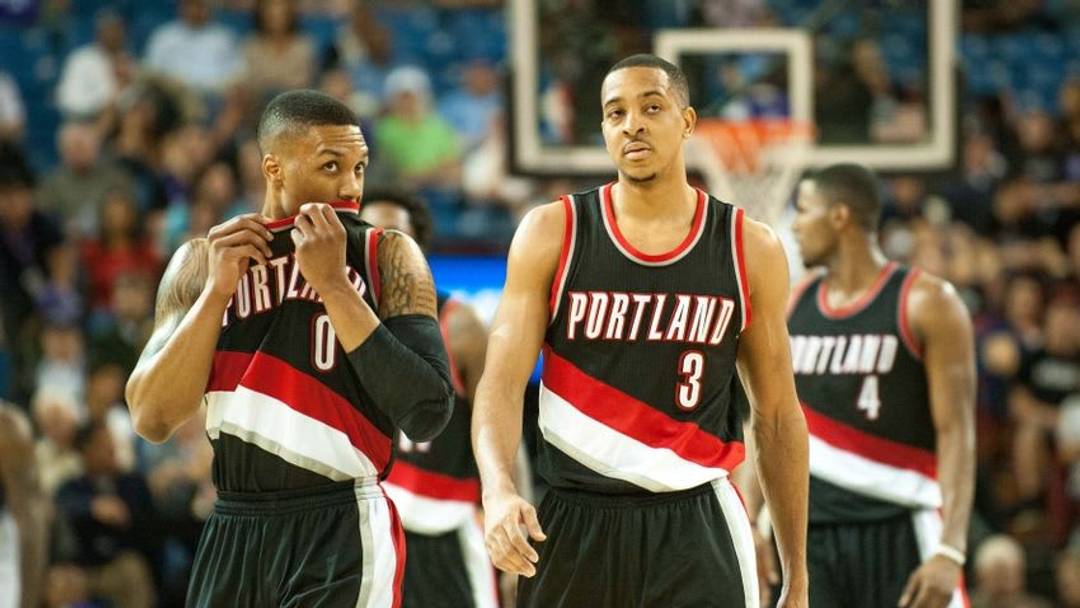Apr 5, 2016; Sacramento, CA, USA; Portland Trail Blazers guard Damian Lillard (0) and guard C.J. McCollum (3) walk up the court during the fourth quarter of the game against the Sacramento Kings at Sleep Train Arena. The Portland Trail Blazers defeated the Sacramento Kings 115-107. Mandatory Credit: Ed Szczepanski-USA TODAY Sports Apr 5, 2016; Sacramento, CA, USA; Portland Trail Blazers guard Damian Lillard (0) and guard C.J. McCollum (3) walk up the court during the fourth quarter of the game against the Sacramento Kings at Sleep Train Arena. The Portland Trail Blazers defeated the Sacramento Kings 115-107. Mandatory Credit: Ed Szczepanski-USA TODAY Sports