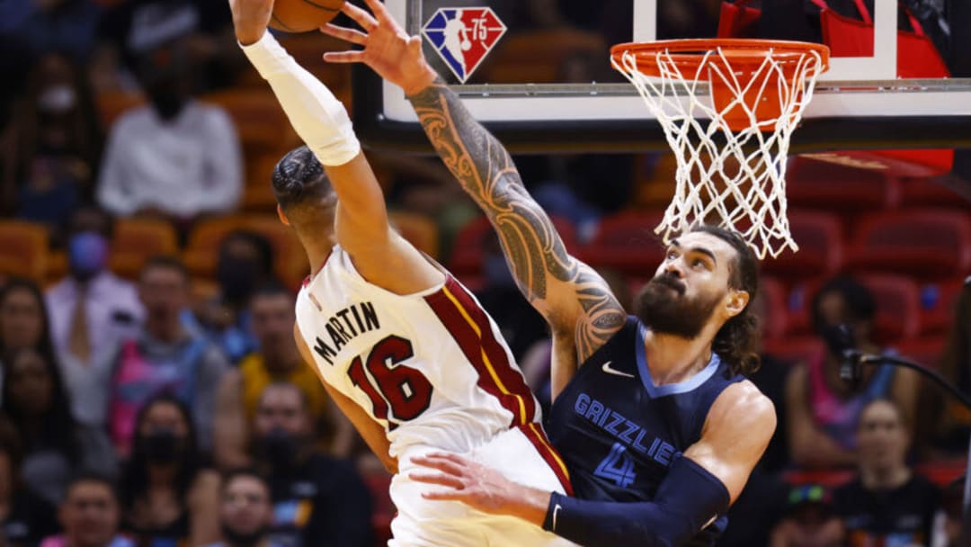 Steven Adams #4 of the Memphis Grizzlies defends a dunk attempt by Caleb Martin #16 of the Miami Heat(Photo by Michael Reaves/Getty Images)