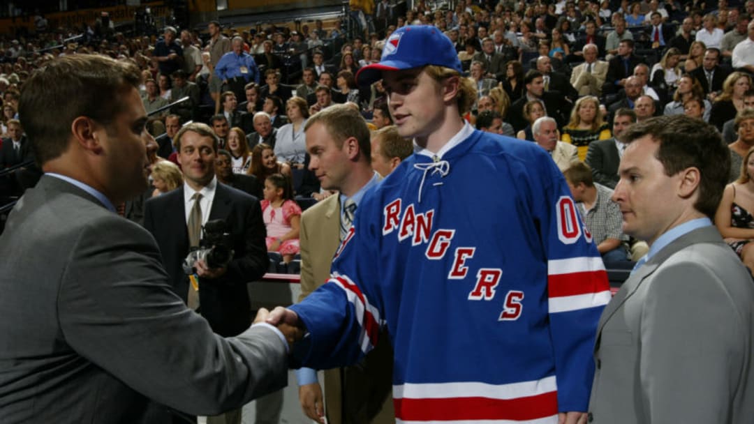 NASHVILLE, TN - JUNE 21: Hugh Jessiman of the New York Rangers is introduced to his new team during the 2003 NHL Entry Draft at the Gaylord Entertainment Center on June 21, 2003 in Nashville, Tennessee. (Photo by Doug Pensinger/Getty Images/NHLI)