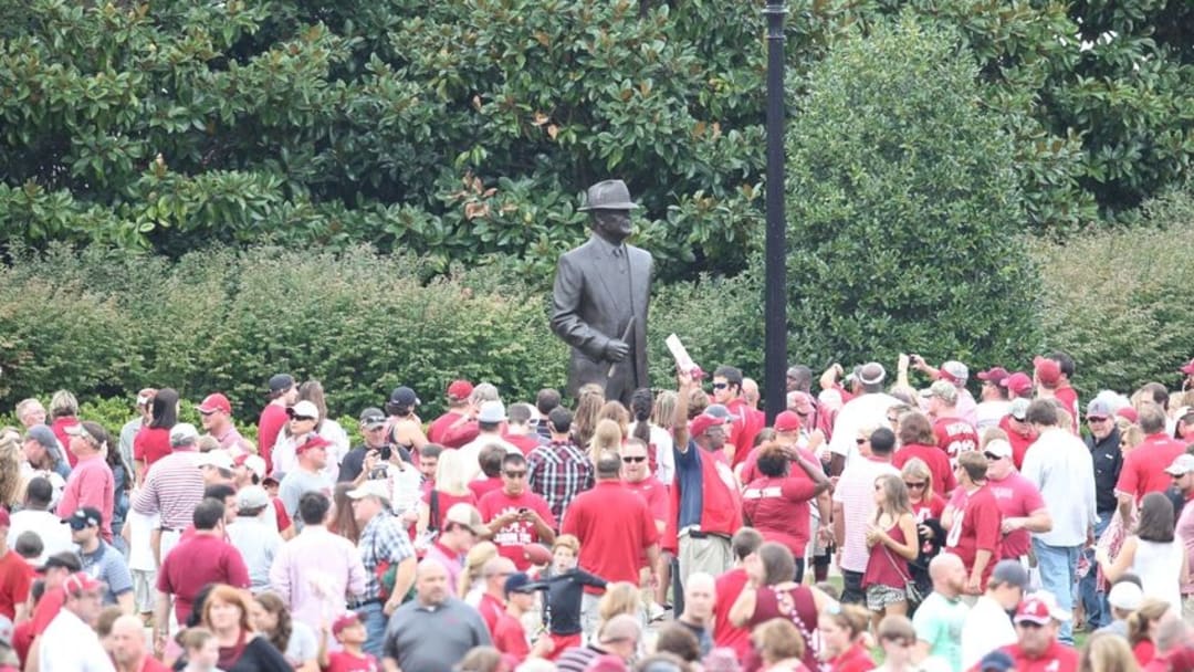 Sep 13, 2014; Tuscaloosa, AL, USA; Alabama Crimson Tide fans crown around the Paul Bear Bryant statue prior the the game at Bryant-Denny Stadium. Mandatory Credit: Marvin Gentry-USA TODAY Sports