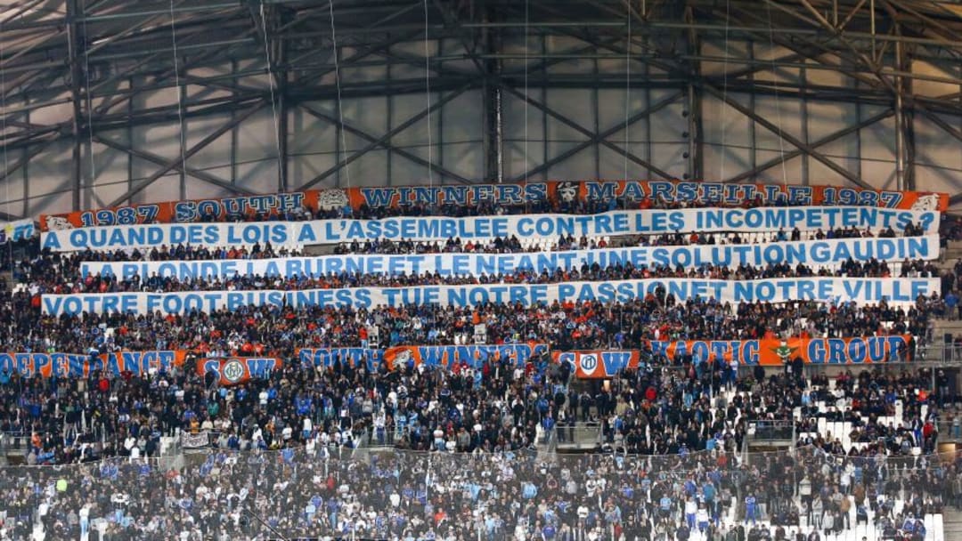 Supporters of Marseille during the French League 1 match between Olympique de Marseille and FC Girondins de Bordeaux at Stade Velodrome on April 10, 2016 in Marseille, France. (Photo by Manuel Blondeau/Icon Sport) (Photo by Manuel Blondeau/Icon Sport via Getty Images)