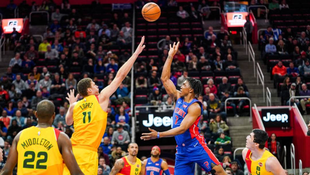 DETROIT, MICHIGAN - JANUARY 29: Stanley Johnson #7 of the Detroit Pistons shoots the ball over Brook Lopez #11 of the Milwaukee Bucks at Little Caesars Arena on January 29, 2019 in Detroit, Michigan. (Photo by Cassy Athena/Getty Images)