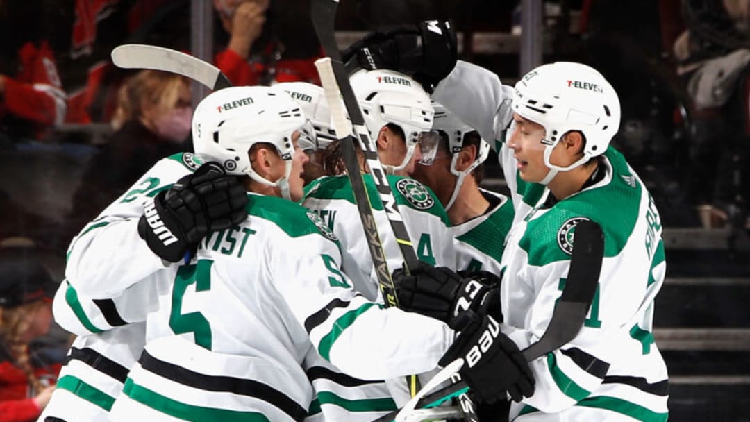 NEWARK, NEW JERSEY - DECEMBER 13: The Dallas Stars celebrate a goal by Roope Hintz #24 against the New Jersey Devils at 19:57 of the second period at the Prudential Center on December 13, 2022 in Newark, New Jersey. (Photo by Bruce Bennett/Getty Images)