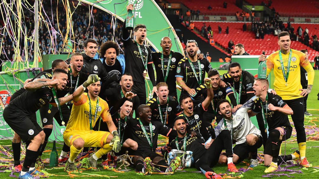 Man City celebrate another EFL Cup triumph.