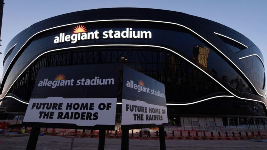 LAS VEGAS, NEVADA - APRIL 23: Crews test out architectural light ribbons and exterior sign lighting as construction continues at Allegiant Stadium, the USD 2 billion, glass-domed future home of the Las Vegas Raiders on April 23, 2020 in Las Vegas, Nevada. The Raiders and the UNLV Rebels football teams are scheduled to begin play at the 65,000-seat facility in their 2020 seasons. (Photo by Ethan Miller/Getty Images)
