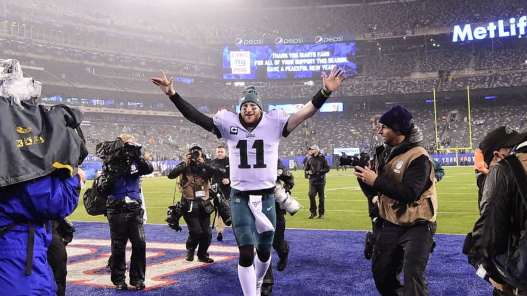 EAST RUTHERFORD, NEW JERSEY - DECEMBER 29: Carson Wentz #11 of the Philadelphia Eagles walks off the field after his teams win over the New York Giants at MetLife Stadium on December 29, 2019 in East Rutherford, New Jersey. (Photo by Steven Ryan/Getty Images)