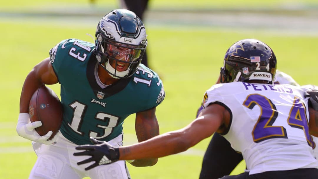 PHILADELPHIA, PENNSYLVANIA - OCTOBER 18: Travis Fulgham #13 of the Philadelphia Eagles runs against Marcus Peters #24 of the Baltimore Ravens during the second quarter at Lincoln Financial Field on October 18, 2020 in Philadelphia, Pennsylvania. (Photo by Mitchell Leff/Getty Images)