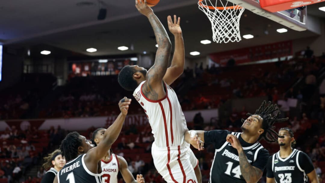 Dec 5, 2023; Norman, Oklahoma, USA; Oklahoma Sooners forward John Hugley IV (1) shoots against Providence Friars during the second half at Lloyd Noble Center. Mandatory Credit: Alonzo Adams-USA TODAY Sports