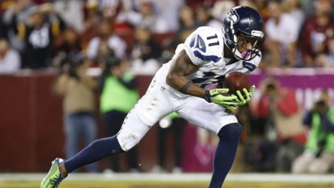 Oct 6, 2014; Landover, MD, USA; Seattle Seahawks wide receiver Percy Harvin (11) catches the ball against the Washington Redskins at FedEx Field. Mandatory Credit: Geoff Burke-USA TODAY Sports