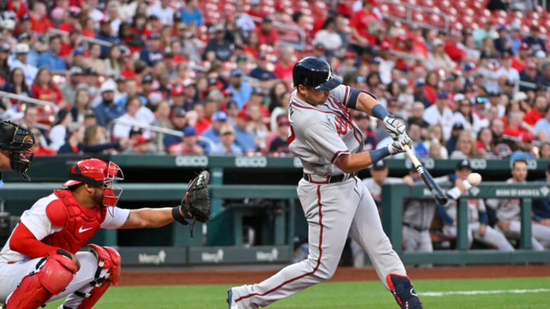 Apr 3, 2023; St. Louis, Missouri, USA; Atlanta Braves third baseman Austin Riley (27) hits a solo home run against the St. Louis Cardinals during the first inning at Busch Stadium. Mandatory Credit: Jeff Curry-USA TODAY Sports