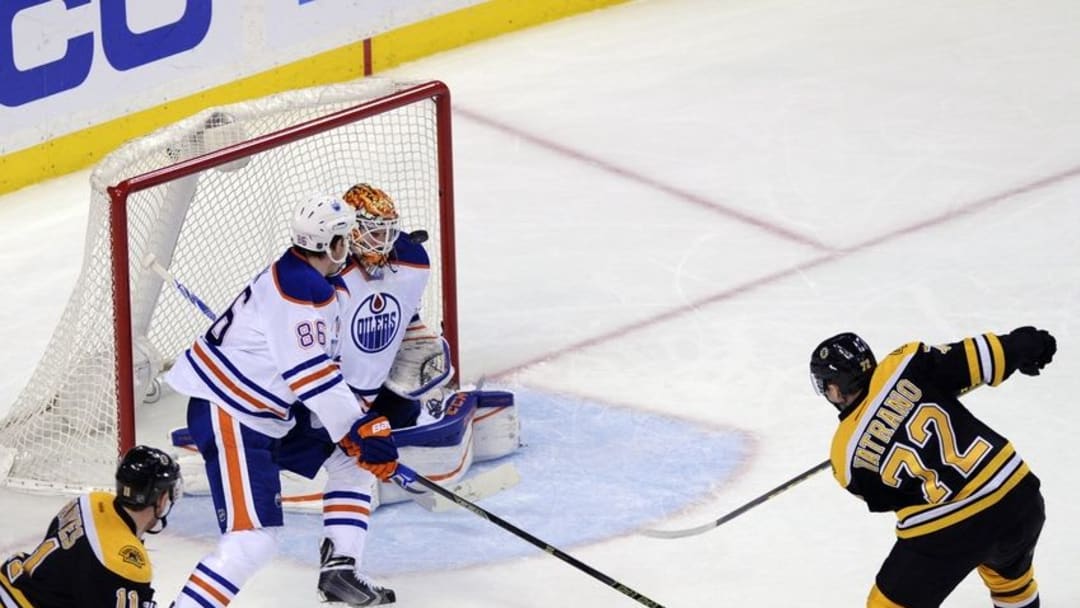 Dec 14, 2015; Boston, MA, USA; Edmonton Oilers goalie Cam Talbot (33) makes a save off of the shot of Boston Bruins center Frank Vatrano (72) during the second period at TD Garden. Mandatory Credit: Bob DeChiara-USA TODAY Sports