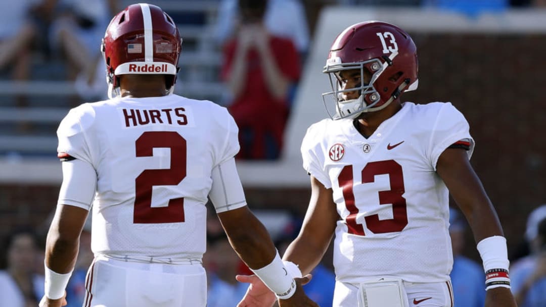OXFORD, MS - SEPTEMBER 15: Tua Tagovailoa #13 of the Alabama Crimson Tide and Jalen Hurts #2 warms up before a game against the Mississippi Rebels at Vaught-Hemingway Stadium on September 15, 2018 in Oxford, Mississippi. (Photo by Jonathan Bachman/Getty Images)