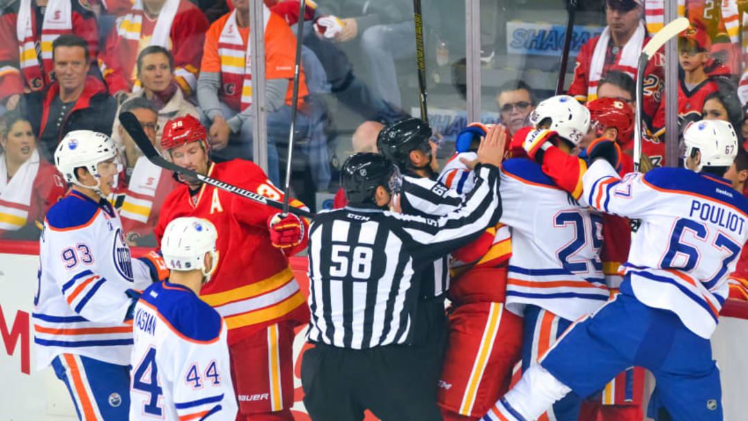 14 October 2016: Calgary Flames Left Wing Matthew Tkachuk (19) and Edmonton Oilers Defenceman Darnell Nurse (25) gets in a fight during an NHL Hockey game between the Calgary Flames and the Edmonton Oilers at the Scotiabank Saddledome in Calgary, AB. (Photo by Jose Quiroz/Icon Sportswire via Getty Images)
