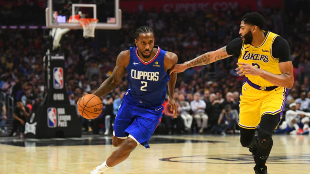 LOS ANGELES, CA - OCTOBER 22: Los Angeles Clippers Forward Kawhi Leonard (2) drives to the basket against Los Angeles Lakers Forward Anthony Davis (3) during a NBA game between the Los Angeles Lakers and the Los Angeles Clippers on October 22, 2019 at STAPLES Center in Los Angeles, CA. (Photo by Brian Rothmuller/Icon Sportswire via Getty Images)